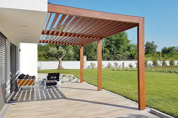 Pergola on passive house with large panoramic windows